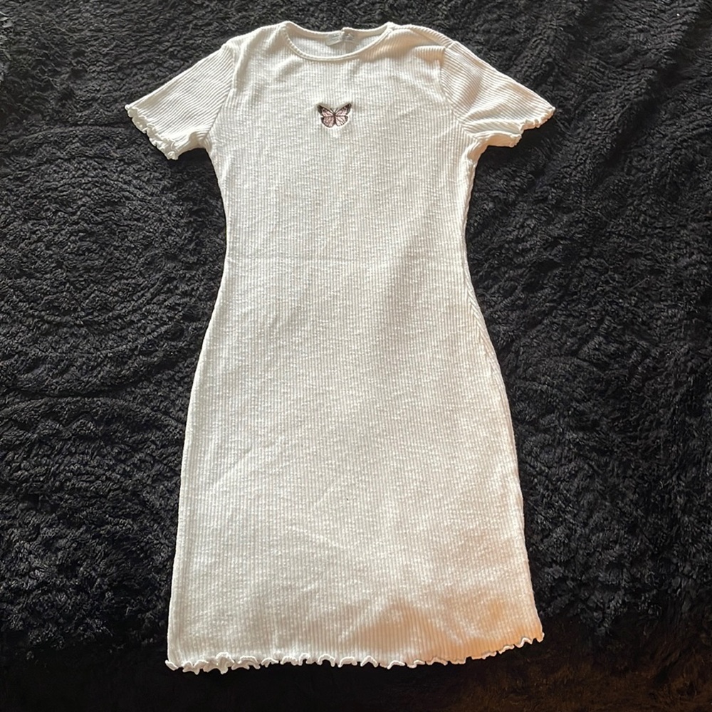 Maxi dress size M Very stretchy comfy fit. Made in Indonesia stop above the knee